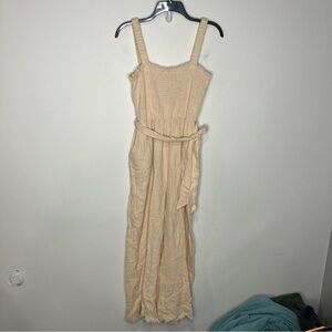 Loveriche cream raw hem jumpsuit open back tie waist women's size medium trendy